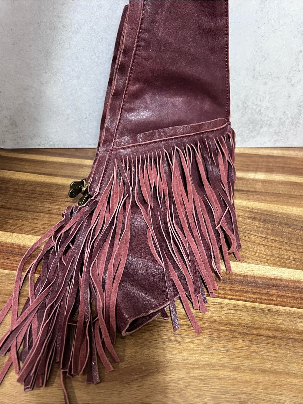 Sash Bag leather fringe crossbody bag in a rich merlot shade, featuring a distin - Picture 4 of 6